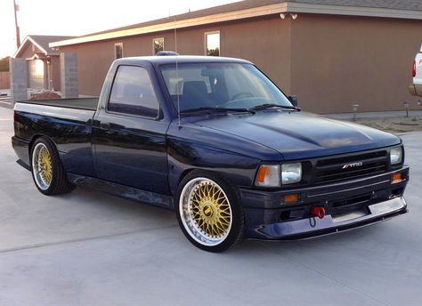 1994 Toyota 2wd truck with E30 M3 style fender flares, lower door skin, rocker, front and rear bumpers and lower fascias. 18" BBS RS wheels round out the look. 1994 Toyota Pickup, Mini Pickup, Drift Truck, Slammed Trucks, Door Skin, Old School Trucks, Bbs Wheels, E30 M3, Lowered Trucks