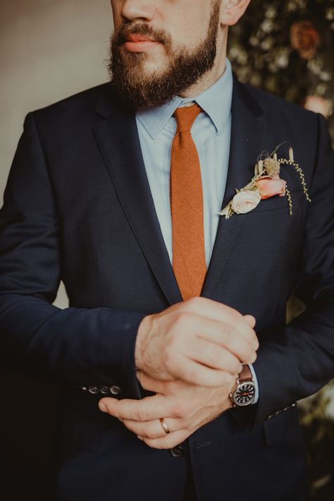 Black Suit With Rust Tie, Black Tux Orange Tie, Black Suit With Burnt Orange Tie, Navy Blue Tuxedo Wedding With Orange, Navy And Burnt Orange Groomsmen, Navy Blue And Burnt Orange Wedding Suit, Blue Suit Rust Tie, Groomsmen Attire Fall Color Combos, Navy Suit Orange Tie Wedding