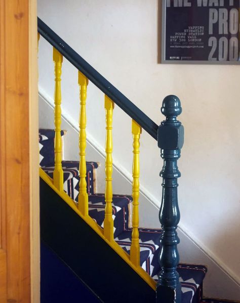 Colourful Banister, Colorful Banister, Painted Stair Banister Ideas, Blue Bannister, Navy Staircase, Paint Banister, Stairwell Inspiration, Stair Banister Ideas, Yellow Staircase