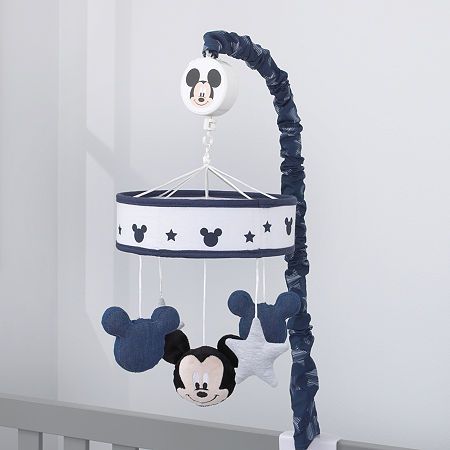 Recommended Ages: 0-5 MonthsBed Size: CribMobile Measurements: 5 Length/InchesBase Material: 100% PolyesterCare: Wipe CleanCountry of Origin: Imported Disney Baby Nurseries, Mickey Mouse Nursery, Star Icon, Baby Mickey Mouse, Classic Mickey Mouse, Disney Nursery, Baby Mickey, Nursery Crib, Crib Mobile