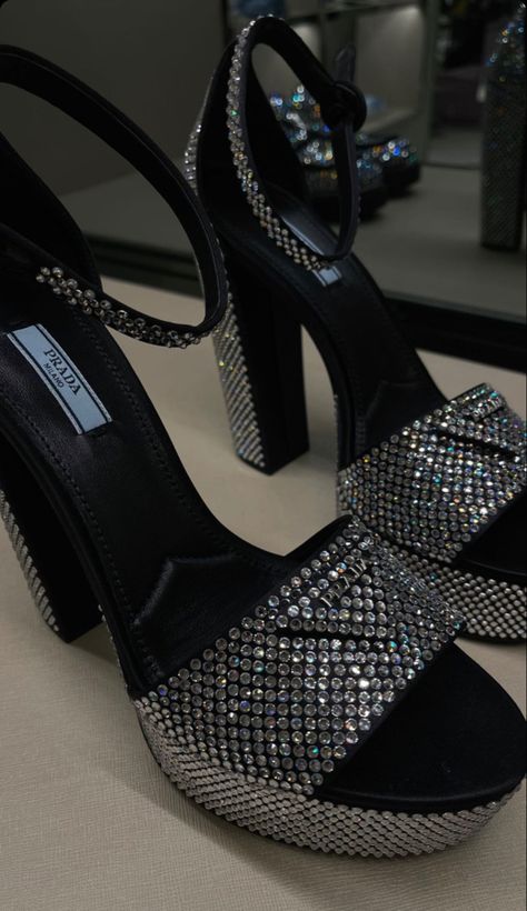 Prada heels, deaigner shoes, luxury shoes, @gabbyadamss_ #giftsforher #designer #chanelbag #blackgirlfashion #blackgirlaesthetic #aesthetic #luxurylifestyle #luxurybag #designerbag #handbag #handbagspurses #luxurylifestyle #expensivelifestyle #prada #shoes #shoesaddict Prada Chunky Heels, Prada Rhinestone Shoes, Black And Silver Heels, Prada Heels, Sparkly Outfits, Party High Heels, Heels Aesthetic, Soft Sandals, Fashion Shoes Heels