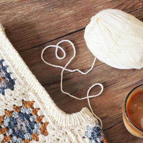 Andie on Instagram: "Allllllmost finished this adorable little vest! Just one more split hem (hidden behind) and about a *million* ends to weave in. I’m going to need a LOT more iced coffee, for that! 😂 Pattern: modified (for size) Agnes Sweater Vest from bethanylynnmakes.com Yarn: Patons Classic Worsted,in Aran, Dark Grey Mix, Light Grey Marl, Natural Mix, and Brown Mustard. Available in-store and online (see shop link in our bio) • • • • • #Crochet #GrannySquares #AgnesSweaterVest #CrochetAndCoffee #CrochetAddict #CrochetAndKnit #CrochetersOfInstagram #GrannyAllDay #PatonsClassicWool #ImpossibleKnotYarnShop #LYS #CanadianYarnShop" Crochet V Neck Sweater Vest, Cropped Sweater Vest Crochet, Crochet Checkered Sweater Vest, Fitted V-neck Crochet Vest Top, Patons Classic Wool, Brown Mustard, Yarn Shop, Split Hem, Sweater Vest