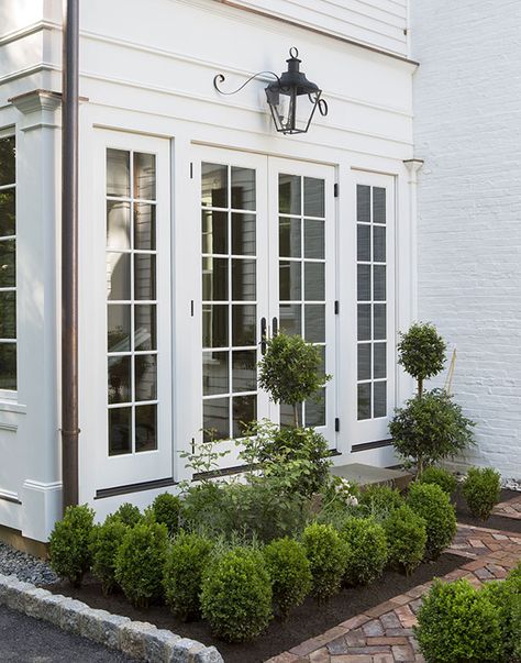 Stately Colonial Home | Princeton, New Jersey | Lasley Brahaney Architecture + Construction Colonial House Patio, Colonial Home Curb Appeal, Colonial French Doors Exterior, French Door Sunroom, Colonial House Windows, Sunroom French Doors, Colonial French Doors, Georgian French Doors, Colonial Patio Ideas