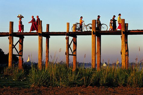 https://flic.kr/p/6133Gy | People crossing U Bein's bridge, Amarapura, Myanmar | People crossing the longest teak bridge in the world at dusk, Amarapura, Myanmar Amarapura, Background For Photography, Myanmar, Sunrise Sunset, Wind Turbine, Teak, Bridge, The World, Photography