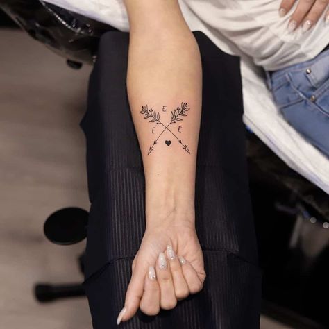 Arrow Tattoo With Name Initial Compass Initial Tattoo, Initial Tattoo On Shoulder, Daughter Initial Tattoo, Cross Arrow Tattoos For Women, Small Remembrance Tattoos Initials, Arrow Name Tattoos For Women, Children’s Initials Tattoo, Initial Tattoo For Kids, 3 Initials Tattoo