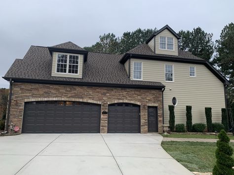 SW black fox trim, SW khaki shade siding, SW fragile beauty window trim. Timberline Saddlewood Ranch roof. Clay Vinyl Siding, Tan Siding, Vinyl Siding House, Black Window Trims, Fragile Beauty, Black Fox, Black Windows, House Siding, Brown Trim