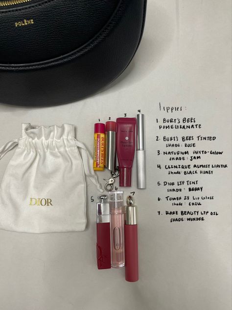 polene numero dix bag, dior dust bag, lip products, lip faves, burt's bees, burt's bees tinted, naturium lip gloss, clinique black honey lipstick, dior lip tint, tower 28 lip gloss, rare beauty lip oil. lippie haul, makeup haul, sephora haul Lip Gloss Accessories, Dior Lip Tint, Black Honey Makeup Look, Burts Bees Pomegranate, Clinique Lip Oil, Lip Oil Dior Dup, Burts Bees Lip Oil, Rare Beauty Lip Oil, Tower 28 Lip Gloss