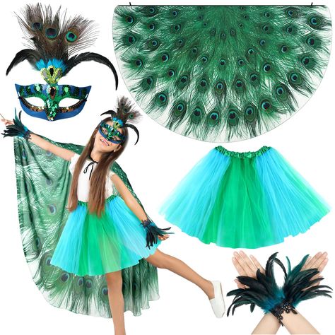 PRICES MAY VARY. chiffon, sequins, simulated feathers, lace Peacock Costume Set: the package includes 1 piece of feather wings, 1 piece sequin mask, 1 piece tulle tutu skirt and a pair of feather cuffs, with the components put together, your child can instantly transform into an elegant peacock and stand out from the crowd Delicate Design and Eye Catching Appearance: our peacock costume women features exquisite details that resemble the striking features of a real peacock, the wings are carefull Wing Mask, Peacock Costume Diy, Peacock Halloween Costume, Peacock Accessories, Feather Tutu, Girls Halloween Dress, Feather Cuffs, Peacock Costume, Feather Cuff