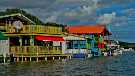 La Parguera, which seems to be a sleepy community in southwestern Puerto Rico, is anything but, with blazing nightlife and an exciting boardwalk to explore. Lajas Puerto Rico, La Parguera Puerto Rico, Parguera Puerto Rico, Best Restaurants In La, Bioluminescent Bay, Puerto Rico Trip, Puerto Rico Vacation, United States Virgin Islands, Architecture Landmark