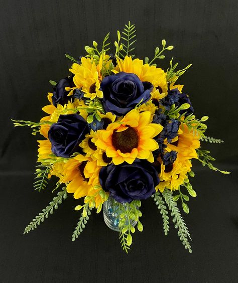 "Bright yellow sunflowers and navy roses are so beautiful together! This is the perfect wedding floral for a country wedding, spring or fall wedding. Dimensions: Bridal bouquet: Cascading is 18\" tall x 11\" wide, round is 15\" wide Bridesmaid bouquet: 9 1/2\" tall x 8\" wide or the larger version is 10\" wide Boutonniere: 4 1/2\" tall x 3\" wide Toss bouquet: much smaller version of the bridesmaid bouquet. There is a limit of 1 toss per order/person. Please message me if you are interested in t Navy And Marigold Wedding, Navy And Sunflower Wedding, Yellow And Navy Wedding, Navy Sunflower Wedding, Navy Blue And Sunflower Wedding, Navy Yellow Wedding, Navy Blue And Yellow Wedding, Navy And Yellow Wedding, Bridal Bouquet Cascading