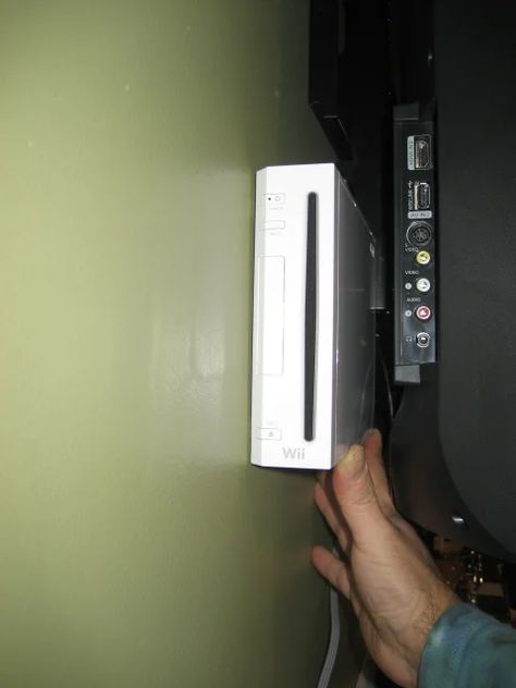 Wall Mount Your Wii for Next to Nothing. : 7 Steps - Instructables Video Game Storage, Drywall Anchor, Stud Finder, Setup Gamer, Wii Console, Game Storage, Sticky Pads, The Basement, New Wall