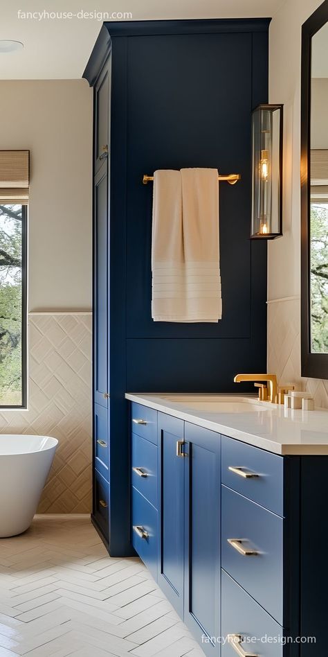 The bold master bathroom design combines sleek cabinetry and eye-catching blue tiles to give it a distinctive yet elegant vibe. Bathroom Color Combinations, Blue Bathroom Design, Blue Bathroom Ideas, Blue Bathrooms Designs, Kitchen Entrance, Cool Shades, Compact Bathroom, Entrance Foyer, Bathroom Color