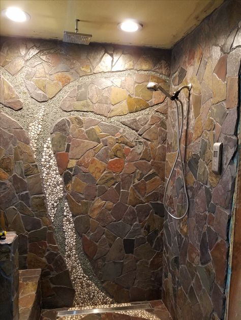 Gorgeously creative pebble tree shower design using Mini Java Tan Pebble Tile and Sliced Java Tan and White Pebble Tile...so stunning!!! https://www.pebbletileshop.com/products/Mini-Java-Tan-Pebble-Tile.html#.WTb9VVUrKUk https://www.pebbletileshop.com/products/Sliced-Java-Tan-and-White-Pebble-Tile.html#.WTb9sFUrKUk Shower Tiles, Pebble Tile, Rustic Bathroom Designs, Bathroom Remodels, Bathroom Shower Tile, Rustic Bathrooms, Bathroom Remodel Shower, Tile Projects, Stone Walls