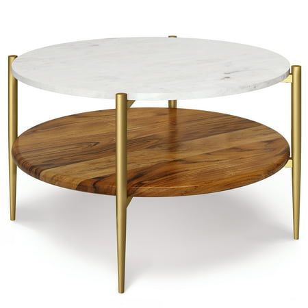 Style and function unite in the handcrafted Wagner Round Coffee Table. Sleek in design, the round natural marble top offers plenty of space while the bottom solid acacia wood shelf allows you to store small objects, books, and magazines. Featuring antique brass look metal frame and legs, this beautiful and versatile Coffee Table will fit easily in your space .. and turn heads at the same time. Color: White. Large Round Table, Coffee Table Frame, Marble Round Coffee Table, Antique Brass Frame, Multipurpose Table, Round Table Top, Wood And Marble, Small Objects, Coffee Table White