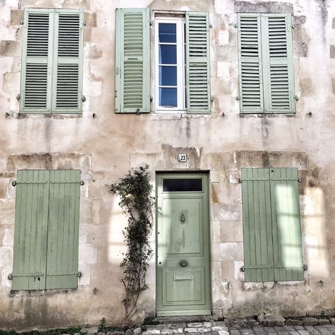 Charming and rustic French farmhouse exterior with Vert Olivier Green Shutters - photo by Vivi et Margot. French Green Color, French Green Paint, French Farmhouse Exterior, Green White Decor, French Country Interiors, Shutter Colors, Painting Shutters, Green Shutters, Blue Green Paints