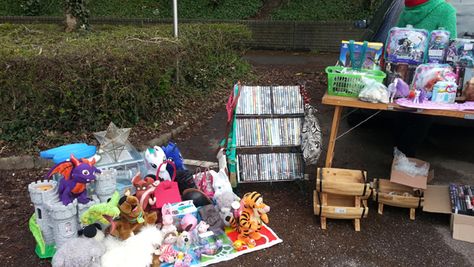 photo of a car boot sale stall with items for sale on the floor, in racks and on a table top Car Boot Sale Display Ideas, Car Boot Sale Display, Car Boot Sale, Sticky Labels, Modern Pictures, Car Boot, How To Survive, Top Cars, Price Guide