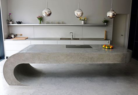 Concrete kitchen island Concrete Outside Kitchen, Modern Concrete Furniture, Cantilevered Island Kitchen, Cantilever Kitchen Island, Microcement Kitchen Island, Concrete Furniture Interior, Cool Restaurant Design, Concrete Furniture Design, Polished Concrete Kitchen