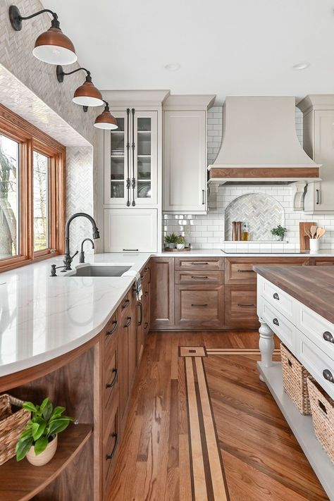 The walnut and maple inlay starts at the same distance from the wall in the new and original kitchen and replicates the exact same woods and color. The design creates the perfect path with the right angles in a display of great artistry. Walnut Kitchen Cabinets With White Quartz, Kitchens With Walnut Cabinets, Black Walnut Cabinets Kitchens, Walnut And White Kitchen Cabinets, Black Walnut Cabinets, Walnut Cabinets White Countertops, Wood Color Cabinets, Walnut Countertop Kitchen, Wood Lower Cabinets White Upper