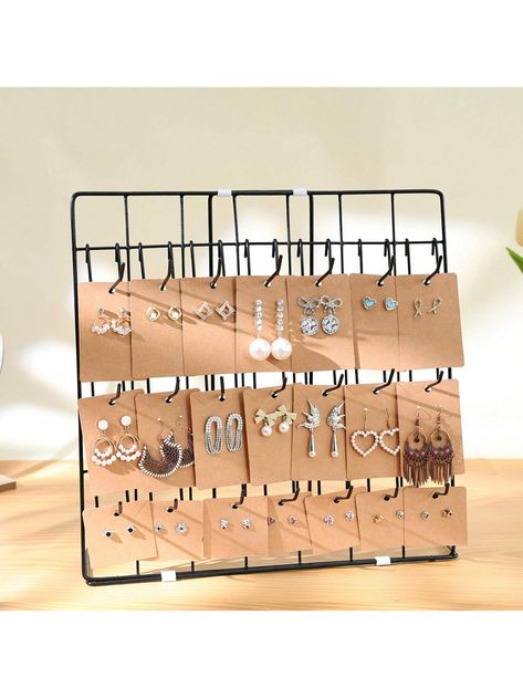 [Easy to Use] The earring organizer stand has a total of 21 hooks, and the number and position of the hooks can be adjusted according to the size and number of products you store. Eeach extended hook can store 5-6 earring cards, you can store more jewelry! The jewelry organizer stand will be a practical and convenient gift! [Premium Quality Materials] The earring holder(13.5*13.5*3.8in) is made of high-quality metal materials, the metal surface is coated with black coating, after hardening treatment, smooth will not scratch the earring. The metal rod on which the earrings are hung has made a slight upward curve, making the jewelry card not easy to fall down from the earring display stand. [No Screws Requried] This earring holder organizer does not need to be assembled with screws. Each par Earring Rack, Cards Necklace, Earring Display Stand, Jewelry Organizer Stand, Earring Display Stands, Bracelet Keychains, Retail Jewelry, Earring Organizer, Metal Surface