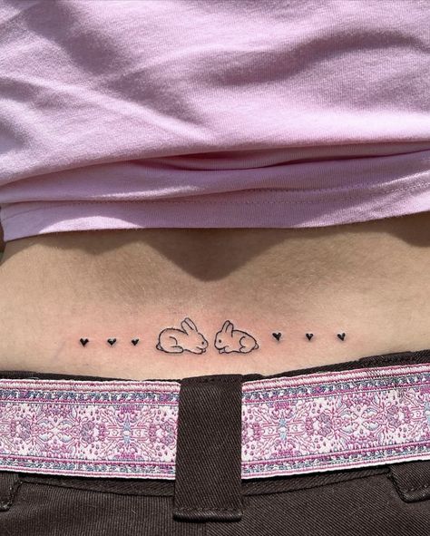 Cute Dainty Tramp Stamp, Small Lower Back Tats, Cute Simple Tramp Stamps, Words Tramp Stamp, Stick And Poke Tramp Stamp, Cherub Tramp Stamp, Kpop Tramp Stamp, Tramp Stamp Hello Kitty, Feminine Tramp Stamps