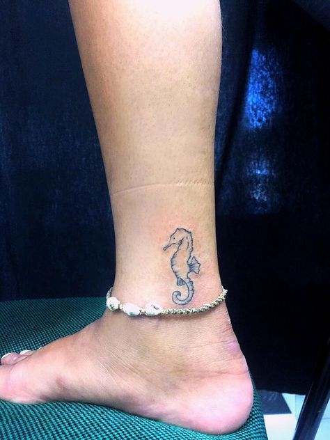 50 Beautiful Foot Tattoo Ideas: Get Inspired Now Dainty Seahorse Tattoo, Seahorse Ankle Tattoo, Small Seahorse Tattoo, Small Animal Tattoo Ideas, Small Animal Tattoo, Inner Ankle Tattoos, Foot Tattoo Ideas, Small Tattoo Ideas For Men, Ankle Foot Tattoo