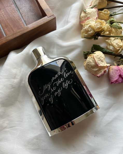 Engraved perfume bottles with a personalized message are one of the most beautiful thoughtful gift indeed. . They combine the elegance of fine fragrance with the uniqueness of a custom inscription, making them perfect for special occasions like birthdays, anniversaries, or even just as a gesture of appreciation. What kind of message would you like to engrave, if you were to gift someone ? 😍 . . #engravingart #delhicalligrapher #delhicalligraphyartist #engravingartistindia #indianengraver #eng.. Luxury Engraved Sentimental Locket Necklace, Perfume Engraving Wedding, Personalised Perfume Bottle, Perfume Engraving, Engraved Perfume Bottle, Engraved Perfume, Calligraphy Artist, Engraving Art, Engraved Gifts