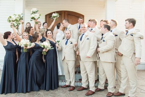 Navy Bridesmaid Dress And Tan Groomsmen, Tan Groomsmen Suits With Blue Bridesmaids, Tan Groomsmen Suits With Bridesmaids, Navy And Tan Wedding, Navy Blue Bridesmaids Dresses, Tan Groomsmen Suits, Tan Suit Wedding, Tan Groomsmen, Navy Blue Groomsmen