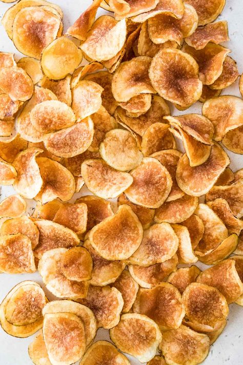 Making homemade kettle chips is so easy! My recipe produces perfectly crisp and crunchy potato chips on the stove--NO deep fryer needed. Recipe includes a how-to video! Homemade Potato Chips, Homemade Pita Chips, Crunchy Potatoes, Party Snacks Easy, Hot Chip, Kettle Chips, Copycat Restaurant Recipes, Deep Fryer, Pita Chips