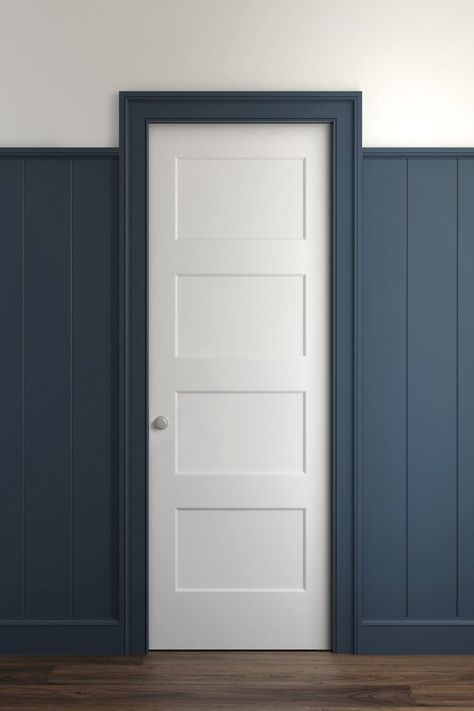 Greek Revival Door casing with V-Groove wainscoting in navy blue. Navy Wainscoting Hallway, Groove Pattern On Door, Navy Blue Paneling, Door Pannelling, Navy Blue Wood Panel Wall, Shaker Interior Doors, Wainscoting Wall Paneling, Wainscoting Wall, Bedroom Closet Doors