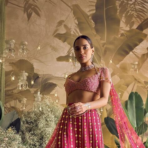 Papa Dont Preach by Shubhika on Instagram: "When she savours the sweetness of solitude, understanding that this chapter of self-discovery is preparing her for a love story like no other, it is #MadLove

Swapnil wearing Georgina, our Magenta sharara set ft. raw silk pants with delicate patchwork + embellished rose pink blouse + adorned asymmetrical dupattas

Jewellery partner: @shobhashringar
Art : @thea3project @ambitrix
Florals by @blacktulipflowers_india 
Creative Director : @thetyagiakshay 

The Bridal Collection is now available at our Flagship Store in Kala Ghoda, Mumbai + www.papadontpreach.com" Raw Silk Pants, Sharara Set, A Love Story, Madly In Love, Silk Pants, Flagship Store, Pink Blouse, Raw Silk, Self Discovery