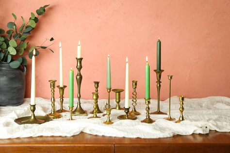 "This vintage brass candlestick set is ready to be added to your vintage home decor or wedding! Use these graduated candlesticks for gold wedding centerpiece, Mid Century mantel decor or Farmhouse table centerpiece. Antique candlesticks in photos are a sample of what I have in stock.  You will receive five (5) vintage brass candlesticks in similar look, quality and size variation but not the exact ones in the photos. You have a choice of shiny, tarnished (dull) or a mixture of finishes. IMPORTAN Boho Candle Holders, Wedding Candle Holders, Gold Wedding Centerpieces, Boho Wedding Centerpieces, Farmhouse Table Centerpieces, Boho Candle, Antique Candle Sticks, Candle Wedding Centerpieces, Candle Wedding Decor