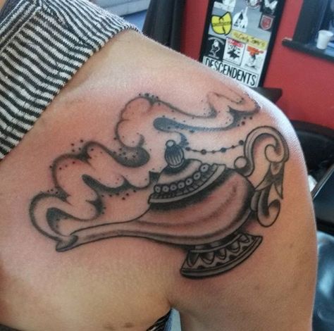 A beautiful genie lamp I came across. I want to get something similar designed on my foot Alladin Lamp Tattoo, Genie Tattoo Ideas, Genie Bottle Tattoo, Aladdin Lamp Tattoo, Magic Lamp Tattoo, Genie Lamp Tattoo, Fairytale Tattoos, Genie Tattoo, Aladdin Tattoo