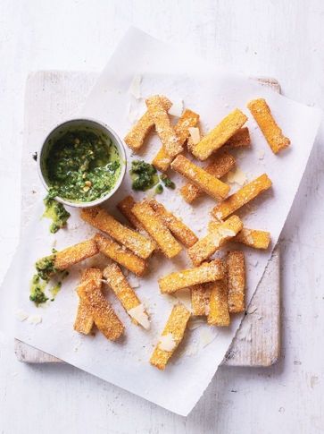 Baked polenta chips with pesto dip Polenta Dishes, Polenta Chips, Baked Polenta, Polenta Fries, How To Cook Polenta, Pretzel Recipe, Pesto Dip, Store Cupboard, Polenta Recipes