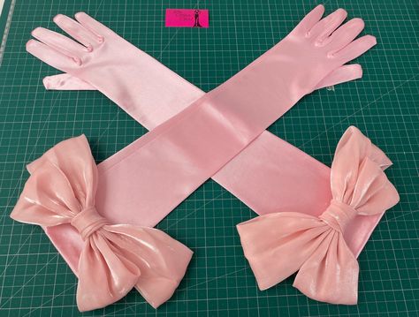 "BABY LIGHT PINK big bow on gloves long opera length elbow shiny satin silky wedding hen do bride cosplay dress up glove bridal dance drag  Absolutely stunning this is my brand new collection, lovely quality stretch satin gloves in lots of beautiful colours  Made with a soft satin, beautiful shine as can be seen in the photos - perfect thickness of fabric. Please see photos for approx measurements, and to see the slight stretch Simple and classy Price includes 1st class signed for postage, I post out as soon as possible, multiple times per week - please purchase the \"express\" delivery at checkout if you are in a rush to receive these gloves  Check out my page for other colours  I have other beautiful gloves on my shop, and more designs coming in the near future so favourite my shop to st Pink Opera Gloves, Pink Satin Gloves, Princess Gloves, Prom Gloves, Bridal Dance, Micro Pigs, Satin Gloves, Gloves Long, Dress With Gloves