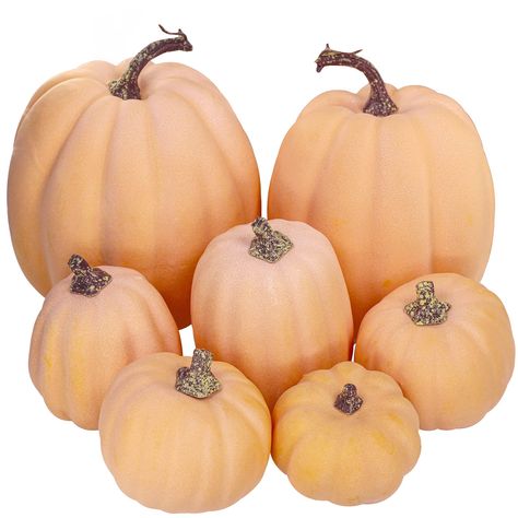 PRICES MAY VARY. Quantity: Package includes 7 pcs orange artificial pumpkins in a mix of sizes. These orange decorative pumpkins will elevate your fall display and add a sweet touch to your Thanksgiving or Halloween decorating. Whether you place them down the center of the table for a festive centerpiece, put them in a bowl as decorative fillers, or just set them on anything from shelves to mantel to add a little flavor, these orange faux pumpkins are the finishing touch you need. Color: These a