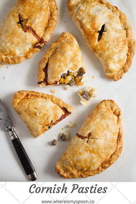 British Cornish pasties – traditional recipe made with beef, rutabaga and potatoes. Who can resist these flaky, golden pastry pockets and that savory filling? #whereismyspoon #cornishpasties #pastyrecipe #britishpasties #britishfood #beefpasties #meatpasties Traditional Cornish Pasty Recipe, Cornish Pasty Recipe, Chicken And Ham Pie, Beef Pasties, Chicken Pot Pie Dinner, Pasty Recipe, Potatoes And Veggies, Pumpkin Pasties, Cornish Pasty