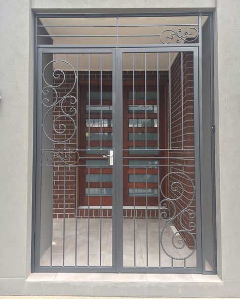 Custom Design Wrought Iron Security Gates Installed on the Alcove. #security #securitydoors #gates #wroughtiron #doors #doorsoftheworld… Staircase Gate, Front Door Security, Metal Gates Design, Iron Security Doors, Security Screen Door, Grill Gate Design, Security Gates, Steel Gate Design, Grill Door Design