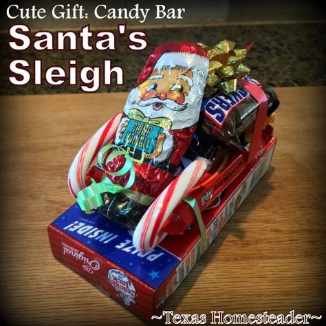 Add Cracker Jacks box to Santa sleigh made of candy cane, candy bars, chocolate Santa and a Kit Kat candybar #TexasHomesteader Candy Sleds For Christmas, Christmas Eve Games, Candy Sleigh, Candy Cane Sleigh, Styrofoam Art, Xmas Candy, Last Minute Gift Ideas, Chocolate Santa, Christmas Candy Gifts