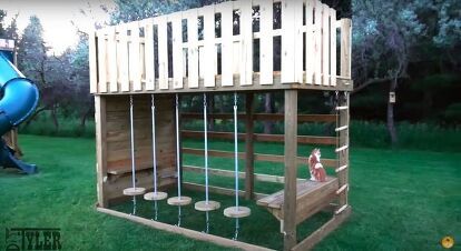 Create hours of fun for your family with this simple DIY jungle gym. Build monkey bars, swings, a rock climbing wall, and a rope ladder by following this step-by-step guide. Treehouse Climbing Wall, Pallet Jungle Gym Diy, Diy Kids Climbing Structure, Diy Jungle Gym Backyards, Diy Climbing Structure, Diy Jungle Gym, Dog Ear Fence, Gym Plans, Backyard Kids