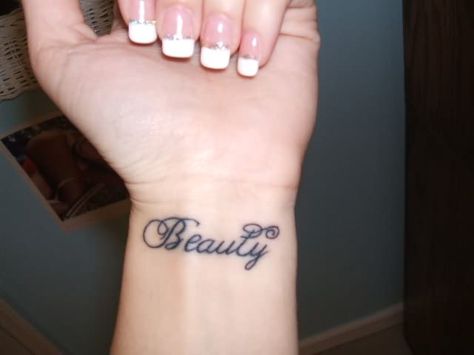 I want this tattoo.   Except i want it to say "beautiful" & on my other wrist i want "hope" Lotus Tattoo Wrist, Cosmetology Tattoos, Couple Wrist Tattoos, One Word Tattoos, Free Tattoo Designs, Cool Wrist Tattoos, Wrist Tattoos For Guys, Best Tattoos For Women, Wrist Tattoos For Women