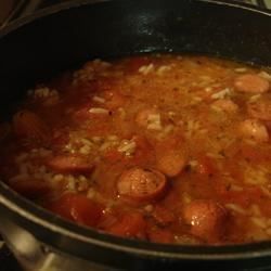 Thickly sliced hot dogs are cooked in a tomato and rice soup base seasoned with cumin, paprika and turmeric to create this hearty dish. Dog Soup Recipe, Tomato And Rice, Hot Dog Soup, Dog Soup, Tomato Rice Soup, Rice And Veggies, Turkey Rice, Recipe Rice, Soup Base