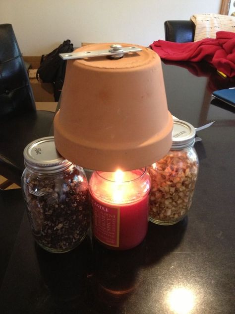 The Homestead Survival: Candle Powered Pottery Heater - would help tp prevent hypothermia in a closed room. Diy Candle Heater, Candle Heater, Diy Heater, Candle Power, Three Candles, Large Candle, Emergency Preparation, Diy Candle, Emergency Supplies