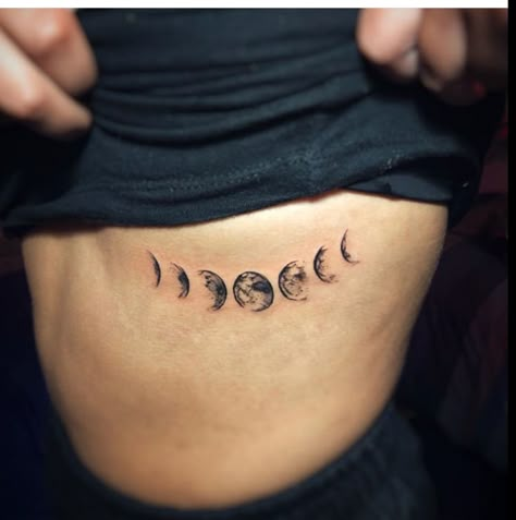 moon phases tattoo Text Tattoo Ribs Women, Phases Of The Moon Tattoo Back, Moon Phase Knee Tattoo, Moon Tattoo On Side Rib, Moon Phases Rib Tattoo, Moon Phase Rib Tattoo, Moon Phases Tattoo Ribs, Stages Of The Moon Tattoo, Moon Phases Tattoo Chest