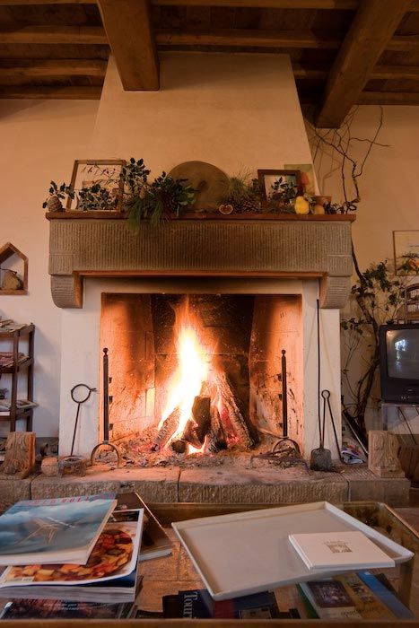 tuscan fireplace | Villa Francesco wedding in Tuscany fireplace Tuscan Fireplace Ideas, Modern Tuscan Home, Tuscan Fireplace, Private Villa With Pool, Tuscany House, Tuscany Home, Villa With Pool, Villas In Italy, Under The Tuscan Sun