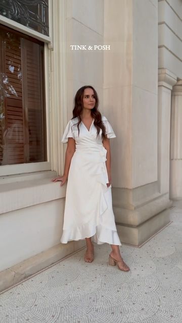 TINK & POSH - Modern Women’s Online Boutique on Instagram: "A gorgeous silky white midi wrap dress. Wear this dress for the holidays, dinners and bridal parties. Shop Tink and Posh new arrivals. #whitemididress #whitedresses #satindress #satinmididress #rehearsaldinner #rehearsaldinnerdress #utahboutique #classystyle #classydress #modestdresses #modestdress" White Midi Wrap Dress, Confirmation Dresses, Rehearsal Dinner Dresses, Bridal Parties, Midi Wrap Dress, White Midi, Satin Midi Dress, Modern Women, White Midi Dress