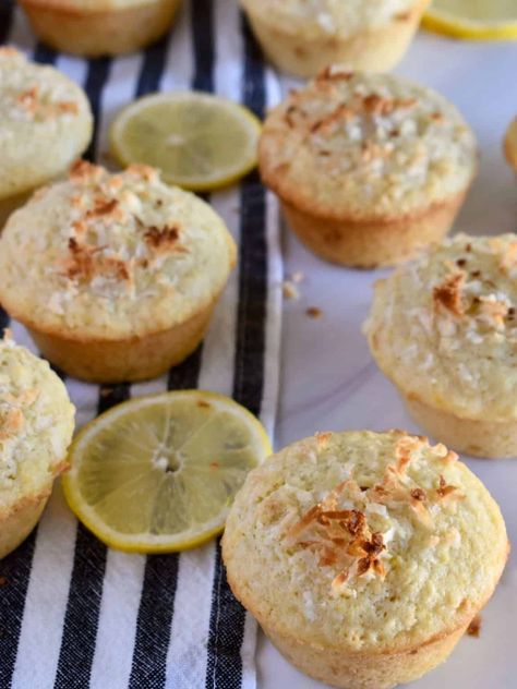 Lemon Coconut Muffins are a delicious tropical-inspired muffin with so much flavor. You're going to love these moist and fluffy muffins that are easy to make and fun to eat. Fluffy Muffins, Coconut Muffins, Lemon Coconut, Shredded Coconut, Muffin Recipes, Yummy Snacks, Scones, Baking Soda, Muffins