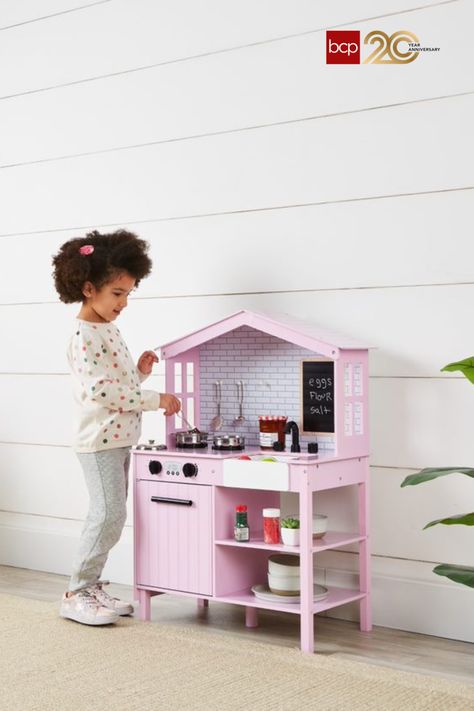 Your little one will enjoy a pretend sink and stove & oven, plus details such as windows, a chalkboard, and cabinet with knobs that click Farmhouse Play Kitchen, Kitchen Toy, Pretend Play Kitchen, Unique Farmhouse, Christmas Tree Shop, Stove Oven, Master Chef, Toy For Kids, Toy Kitchen