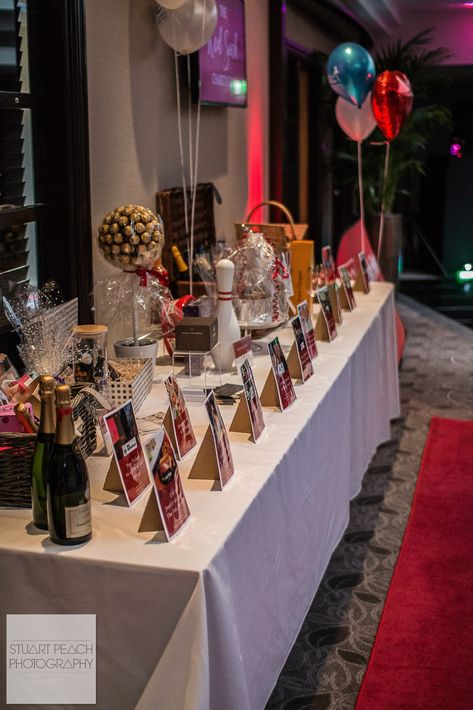 Raffle Prize Display Table @ The Red Sock Gala 2018 #Display #Fundraising #Auction #Raffle Fundraising Table Display, Raffle Set Up Ideas, Fundraising Decorating Ideas, Silent Auction Displays, Prize Table Display, Silent Auction Set Up, Raffle Table Display Ideas, Prize Display, Auction Decorations