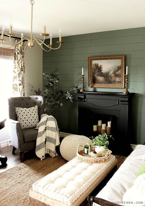 Farmhouse With Green Accents, Sage Gray Living Room, Green Room Black Trim, Black Furniture Green Walls, Green Focus Wall Living Rooms, Moss Green Living Room Walls, Two Tone Green Living Room, Green Living Room Cabinets, Green Wall Black Fireplace