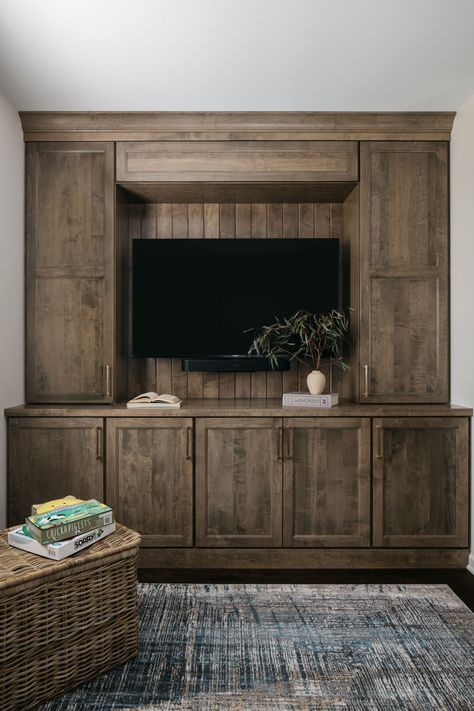 Built-ins that effortlessly blend style and function—because storage should be as beautiful as it is practical! 📚✨  Photographer: Margaret Rajic Styling: Jenny Officer Design + Construction: Forest Glen Design x Build Wood Stain Built In, Pitched Ceiling, Tv Built In, Built In Entertainment Center, Shed Cabin, Laundry Room Renovation, Chicago Design, Custom Kitchen Cabinets, Room Renovation